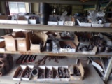 Bottom shelf of black pipe fittings