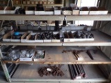 Shelf of threaded black pipe fittings/bushings