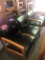 (4) Black leather waiting room chairs