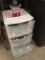 Plastic bin of decorative items