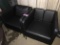 (2) Black leather side chairs