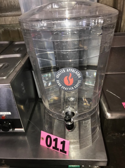 Clear plastic coffee dispenser