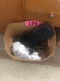 Box of keyboards & misc. computer cords