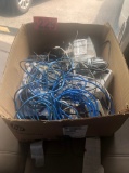 Box of phone cords & phone system managements