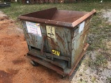 Self dumping dumpster