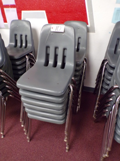 (12) Gray plastic school desk chairs