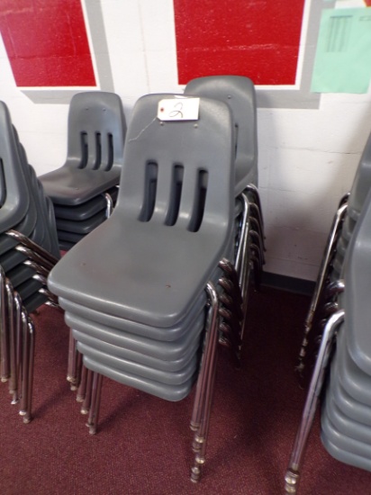 (12) Gray plastic school desk chairs