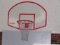 Basketball rim and backboard