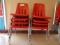 (8) Orange school chairs