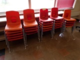 (24) Red and orange plastic school chairs