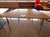 Trapezoid shape table