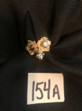 18K gold ring with 2 diamonds, 1/2 and 1/4 carats. 1 stone missing. Est. value at $1200- $2850