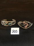 (2) Sterling silver and turquoise Indian figure cuff bracelets