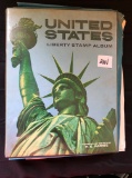 Liberty Stamp Collection book w/ supplements, approx. 90% complete