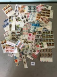 Large lot of blocks and loose assorted vintage and early stamps