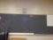 20 ft blackboard, aluminum framed w/ bulletin board (4th gr rm)