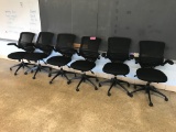 (6) Black ergonomic rolling desk chairs (Rm 306)
