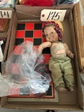 Checker board & old wooden doll