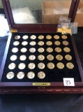 Incomplete Presidential gold dollars w/ silver inlay & box