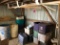 Contents under stairs: Plastic tubs of toys & holiday décor, wood trim, bar