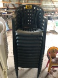 Stack of (12) green plastic chairs NO SHIPPING
