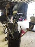 Barrel of brooms, showvels, rakes, spades  NO SHIPPING