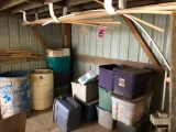 Contents under stairs: Plastic tubs of toys & holiday décor, wood trim, bar