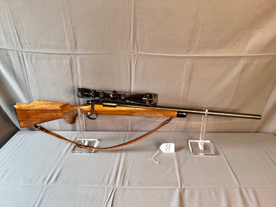 Remington Model 700 22-250 Rem with Redfield 4-12x scope, with leather slin