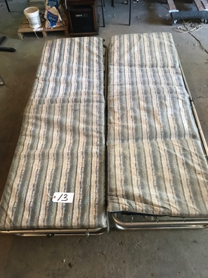 (2) Aluminum cots w/ cushions