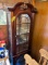 Cherry finished glass front & sides curio cabinet