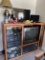 Entertainment center & contents: (2) TV's, stereo, speakers, casette tapes
