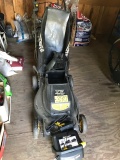 Yard Works cordless self propelled, 18in, 24volt mower w/ new battery & bag