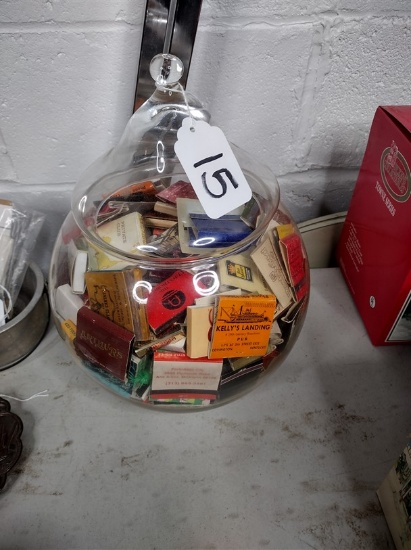Large glass bowl filled w/ advertising matchbooks