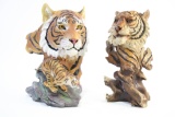 TWO PLASTIC TIGERS HEADS