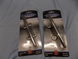 TWO 6IN STAINLESS STEEL CLEATS