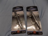 TWO 6IN STAINLESS STEEL CLEATS