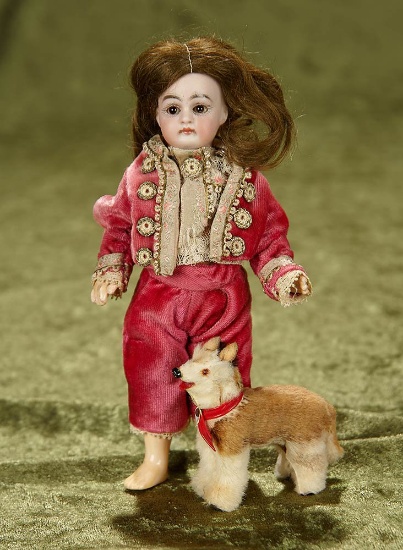 6 1/2" Petite German bisque closed mouth doll by Kestner with pet dog. $400/600
