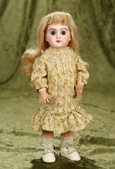 11" Petite French bisque brown-eyed Bebe Jumeau with closed mouth, signed body. $2200/2500