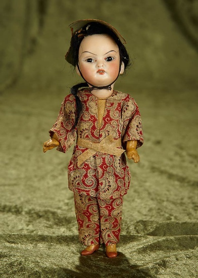 8" Sonneberg bisque Asian Child in factory original costume. $200/400