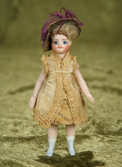5" French all-bisque mignonette with large cobalt  eyes and pale blue boots. $600/900