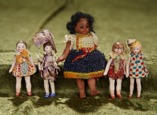Five German all-bisque dolls. $300/400