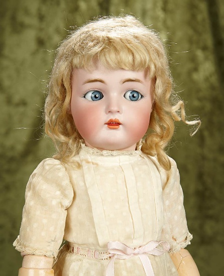 21" German bisque flirty-eyed child by Kammer and Reinhardt, original wig and costume. $800/1000