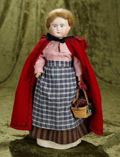 15" German bisque doll with appealing  peddler costume. $300/500