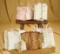 Collection of six corsets and stays for poupees and bebes. $400/500