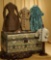 French doll trunk with rare decorations, along with costumes for lady doll. $600/800