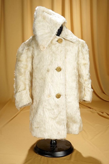 Cream mohair coat and cap with original brass labeled buttons. $400/600
