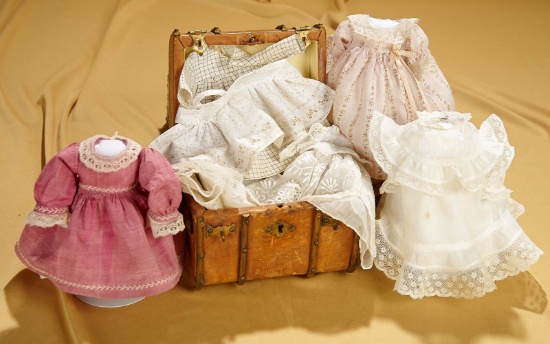Trousseau of pretty dresses for 8"-9" child dolls, in leather bound trunk. $400/700