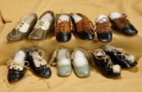 Six pairs of antique doll shoes including aqua shoes signed E. Jumeau Paris. $400/500