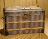 French wooden domed doll trunk with double trays. $400/600