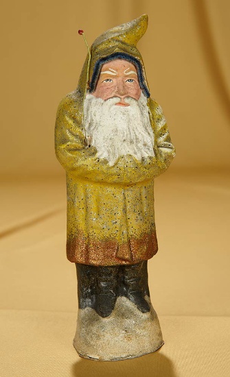 10" Antique German paper mache Belsnickel candy container with gold robe. $400/600